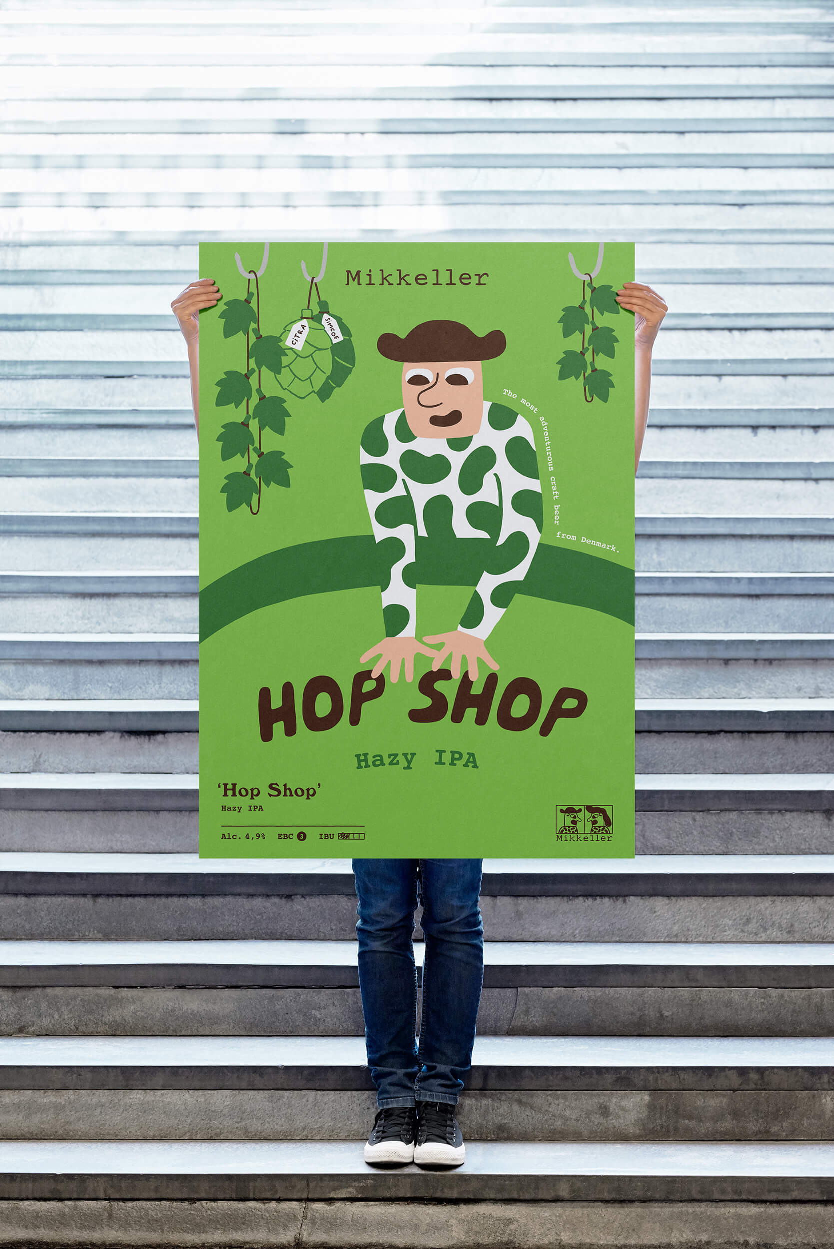 Campaign poster for Mikkeller Hop Shop Hazy IPA featuring Henry in a cow-print shirt hopping over the title
