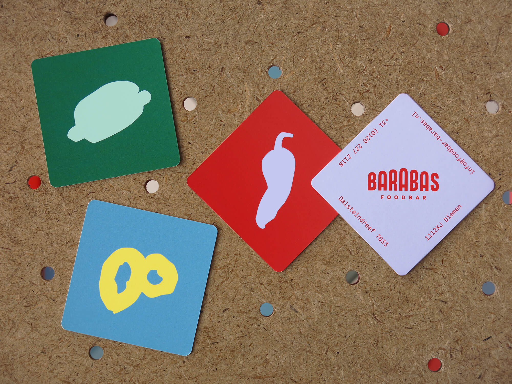 Foodbar Barabas identity design: business card with playful calamaris, pimenton and hot dog illustrations